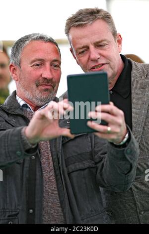 Suggs  stops for a picture with a fan, before making his way to the Tata tent where he was talking about his early life and years as a musician on sta Stock Photo
