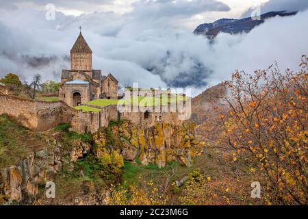 Tatev Monastery in the fog and clouds, Armenia Stock Photo