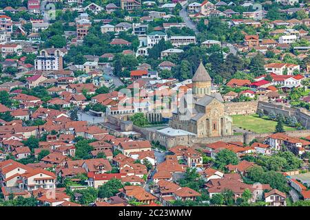 Aerial view over the old town Mtskheta and the Cathedral of Svetitskhoveli in Georgia, Caucasus Stock Photo