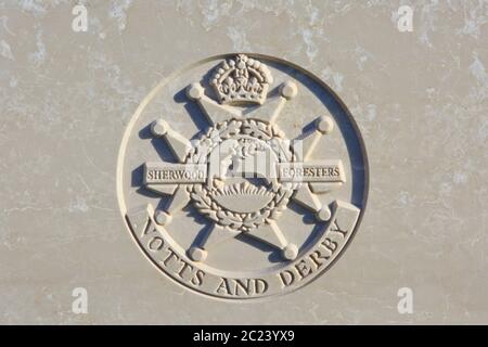 The Sherwood Foresters (1881-1970) regimental emblem on a World War I headstone at Tyne Cot Cemetery in Zonnebeke, Belgium Stock Photo