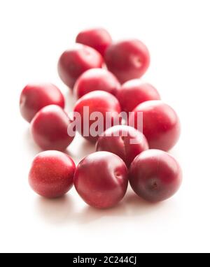 The red cherry plums fruit isolated on white background. Stock Photo