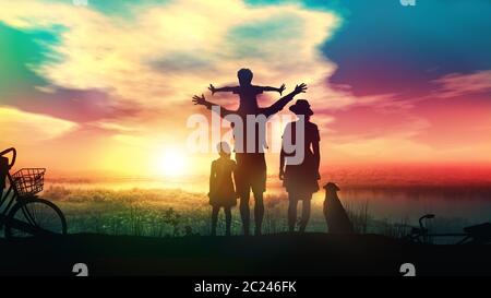 Family with children watching a bright and fabulous sunset. Stock Photo