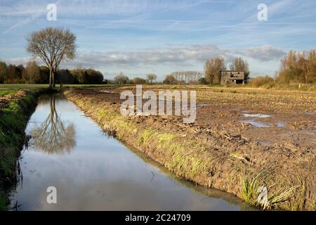 Old shed along the river Giessen near Hoornaar in the Dutch region Alblasserwaard Stock Photo