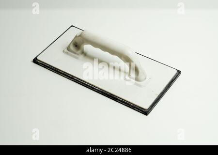 Moss rubber pad for grouting tiles Stock Photo