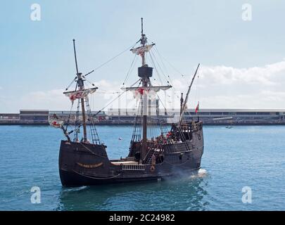 the replica santa maria sailing ship leaving funchal harbor for a cruise around madeira Stock Photo