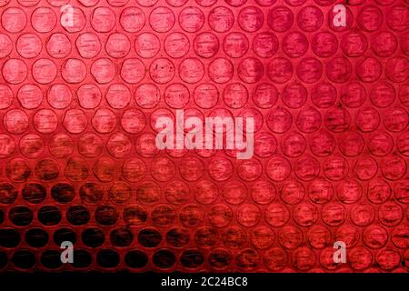 Red plastic bubble wrap texture for background Stock Photo