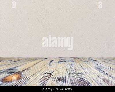 washed wood table with concrete texture background. Stock Photo