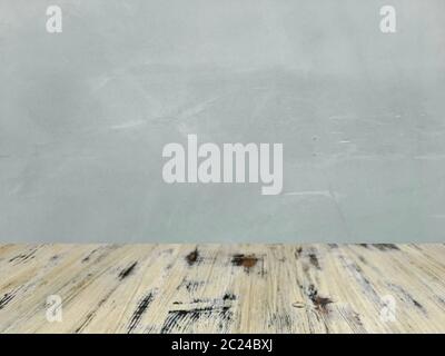 washed wood table with concrete texture background. Stock Photo