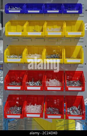 Colour Plastic Sorting Trays With Bolts and Nuts Parts Stock Photo