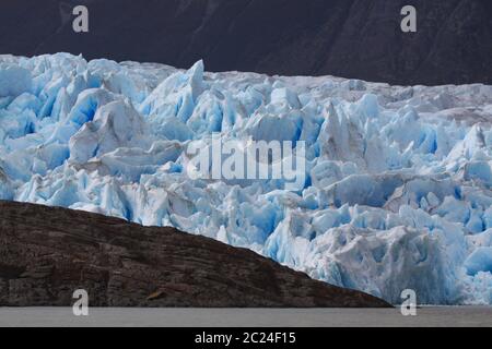 Glacier tongue in South America with icebergs Stock Photo