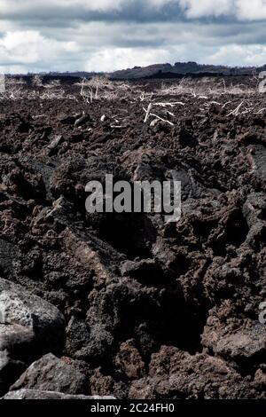 Gloomy lava field reminiscent of the scene Mordor in Middle Earth Stock Photo