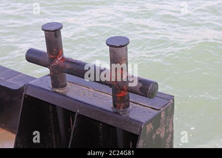 Marine Steel Double Dock Mooring Bitt Bollard at Dock Stock Photo