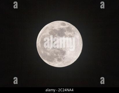 Full moon on black background almost duotone Stock Photo
