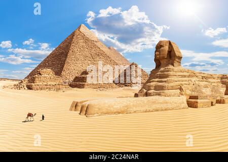 The Pyramids and the Sphinx in the sunny desert of Giza, Egypt Stock ...