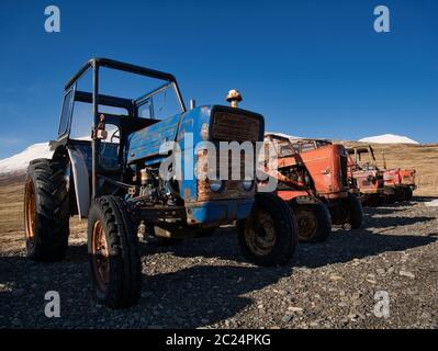 Several vintage tractors of different brands. Photo from April in Iceland Stock Photo