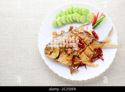 Deep Fried White Pomfret With Black Pepper Garlic Stock Photo