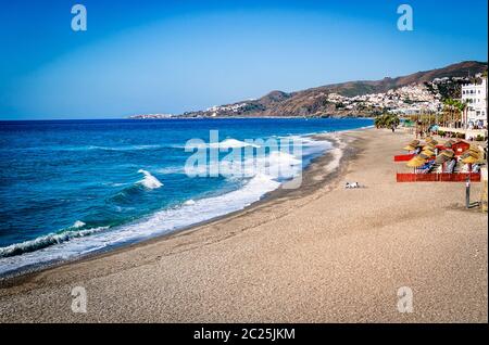 The beach of Nerja (Playa el Chucho), tourist resort Malaga region, Costa del Sol, Andalucia, Spain Stock Photo