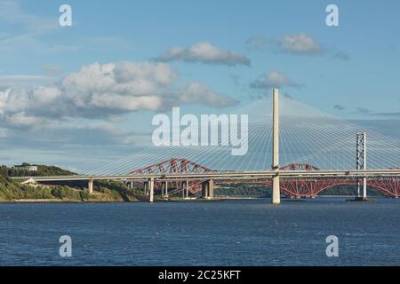 The new Queensferry Crossing bridge over the Firth of Forth with the older Forth Road bridge and the Stock Photo