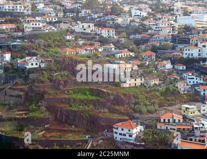 aerial view of the of houses and market gardens of funchal with terraced agriculture Stock Photo