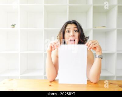 Asian woman holding blank white paper Stock Photo