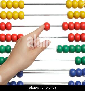 Female hand counting on an abacaus isolated on white background. Mathematics Stock Photo