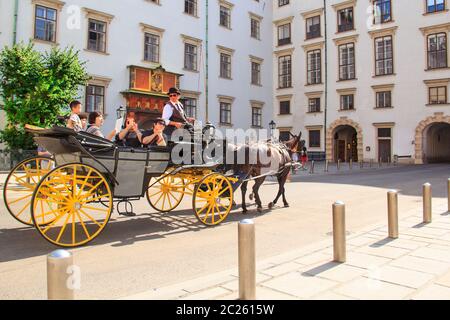 Excursion carriage near the Hofburg castle on AUGUST 24, 2017 in  Vienna, Austria Stock Photo