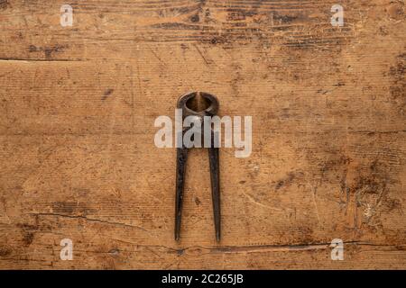 Hoof Pliers on a wooden vintage background Stock Photo