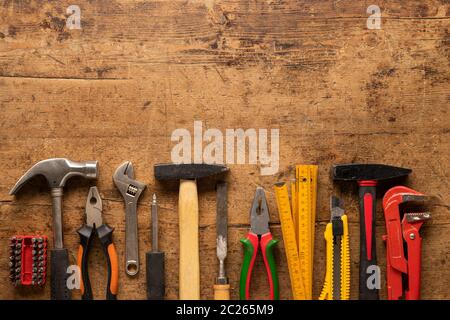 Many tools on a wooden vintage background Stock Photo
