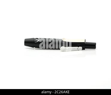 Lancing pen device isolated on white background with copy space Stock Photo