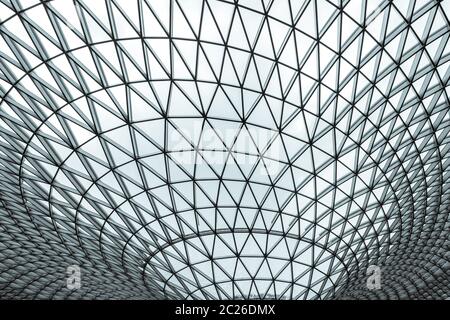 Glass and steel building with triangle pattern structure. Futuristic architecture. Neo-futurism architectural style. White triangle geometric dome tex Stock Photo