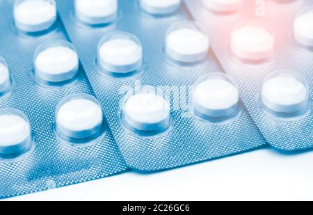 Tablet pills in blister pack on white background. Chewable tablet pills for treatment parasite in human. Anthelmintic effective against threadworm or Stock Photo