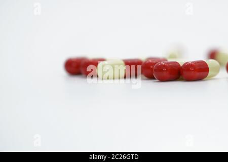 Antibiotic capsule pills on white background with copy space, drug resistance concept Stock Photo