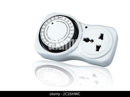Plug-in timer mechanical 24 hour. Indoor home tools. Plug-in timer socket set isolated on white background. Mechanical outlet timer. Home security sup Stock Photo