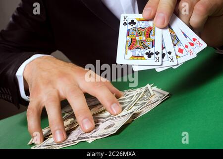 Good luck or success in poker card game and gambling at the table. Stock Photo