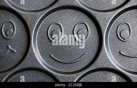 Frying pan for cooking cheerful smiling pancakes Stock Photo