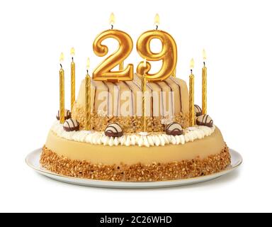 Festive cake with golden candles - Number 29 Stock Photo