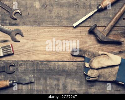 Old used tools on a workbench with space for text Stock Photo