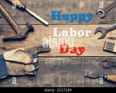 Old used tools on a workbench, Happy Labor Day concept Stock Photo
