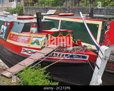 a close up of old barges at the narrow boats club gathering held on the may bank holiday on the rochdale canal at hebden bridge Stock Photo
