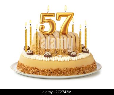 Festive cake with golden candles - Number 57 Stock Photo