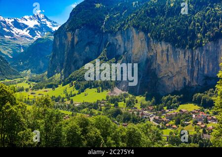 Lauterbrunnen valley, village of Lauterbrunnen, waterfalls and the Lauterbrunnen Wall in Swiss Alps, Switzerland. Stock Photo