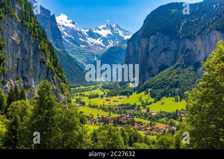 Lauterbrunnen valley, village of Lauterbrunnen, waterfalls and the Lauterbrunnen Wall in Swiss Alps, Switzerland. Stock Photo