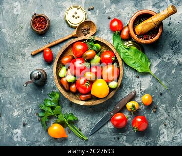Marinated tomatoes with spices.Canning tomatoes.Pickling of ripe tomatoes Stock Photo