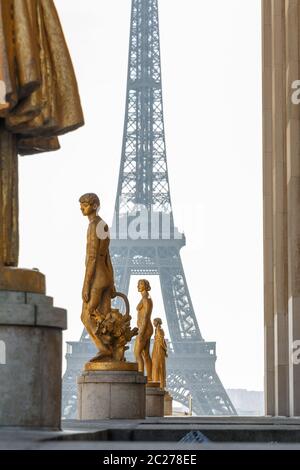 Paris, France, March 27 2017: Row of golden statues, Place du Trocadero in city Paris,on a summer morning, in front of the Eiffe Stock Photo