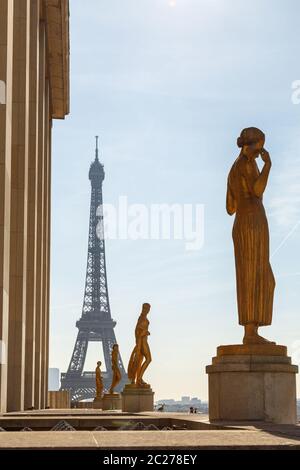 Paris, France, March 27 2017: Row of golden statues, Place du Trocadero in city Paris,on a summer morning, in front of the Eiffe Stock Photo
