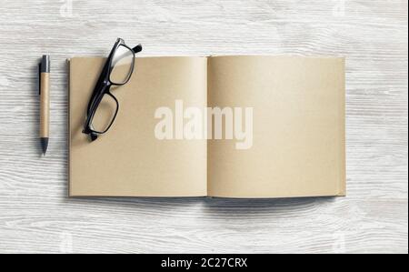 Notepad, pen, glasses Stock Photo