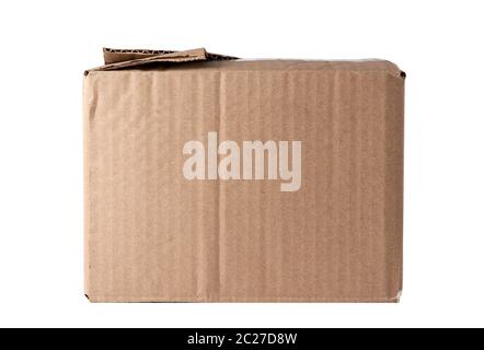 closed brown rectangular box of cardboard on a white background, packaging for goods Stock Photo