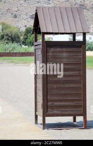 Wooden public change rooms on the beach. Colorful change rooms. Holiday concept. Stock Photo