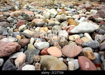 Abstract Smooth Round Pebbles on a Beach Stock Photo