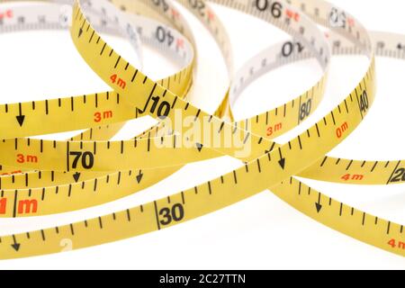 Industrial measuring tape surveying isolated on a white backgroundã€€ Stock Photo